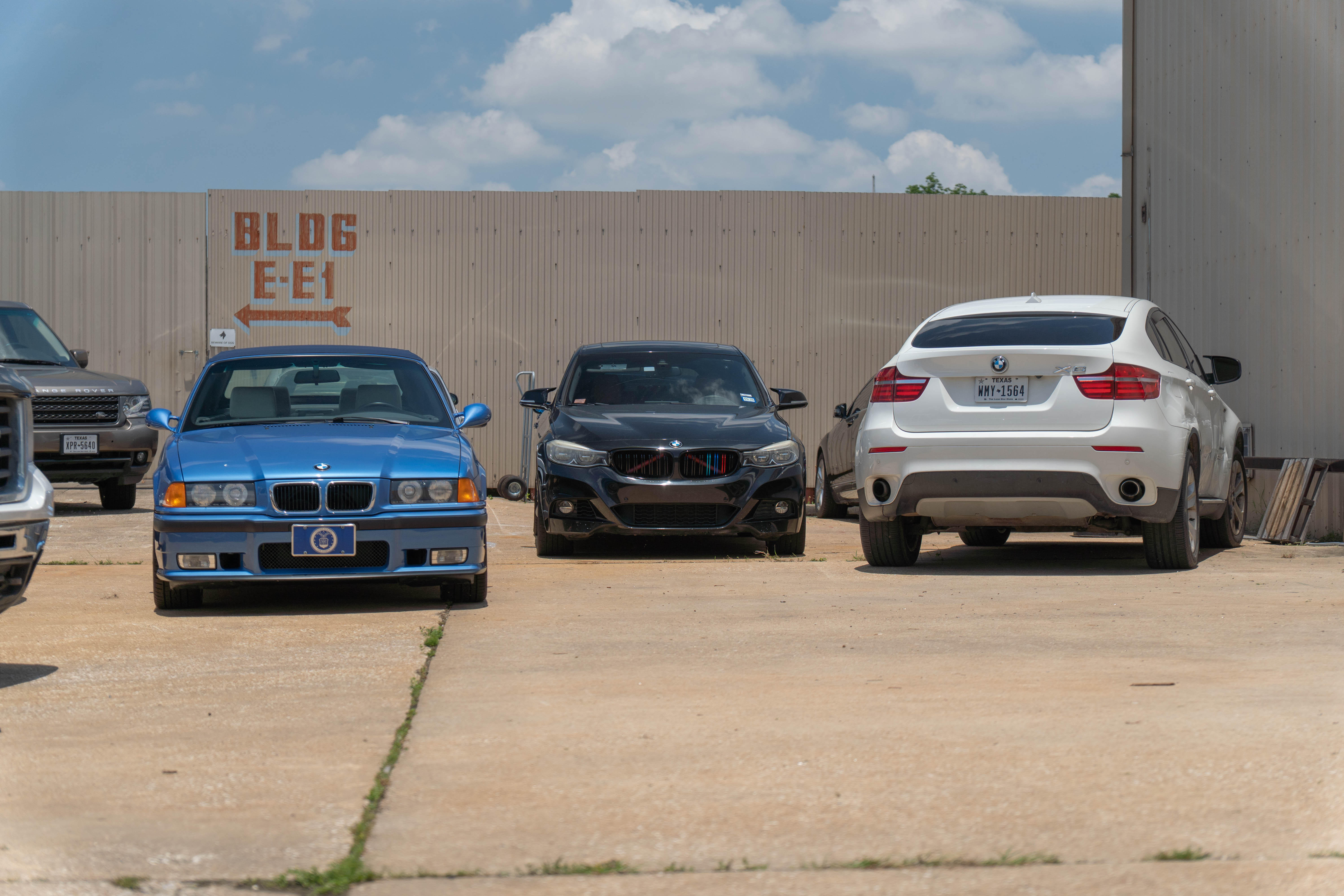 Group photo of BMW E36 M3, F30 3 Series, and BMW X6 head-on