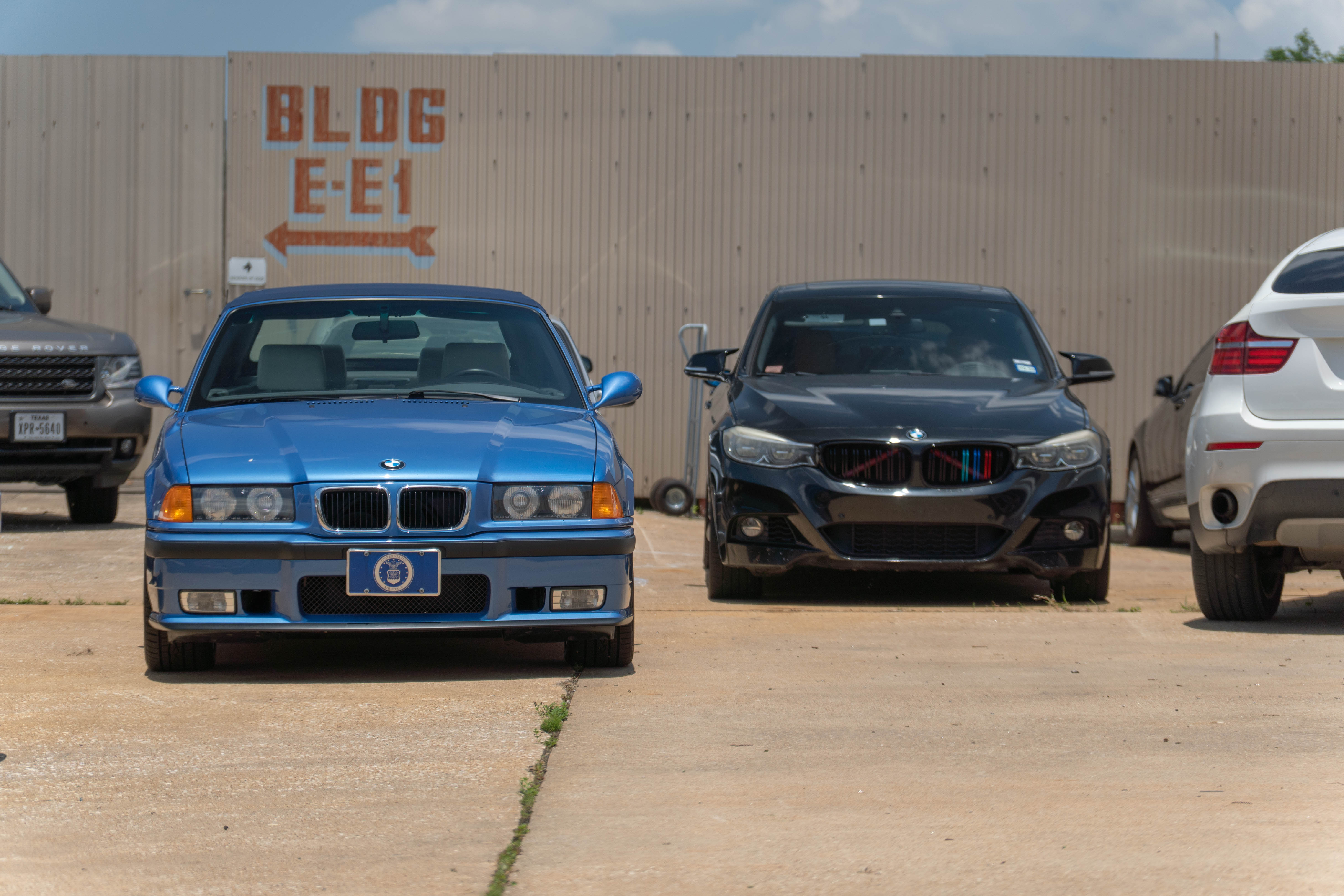 Group photo of BMW E36 M3 and F30 3 Series head-on 3