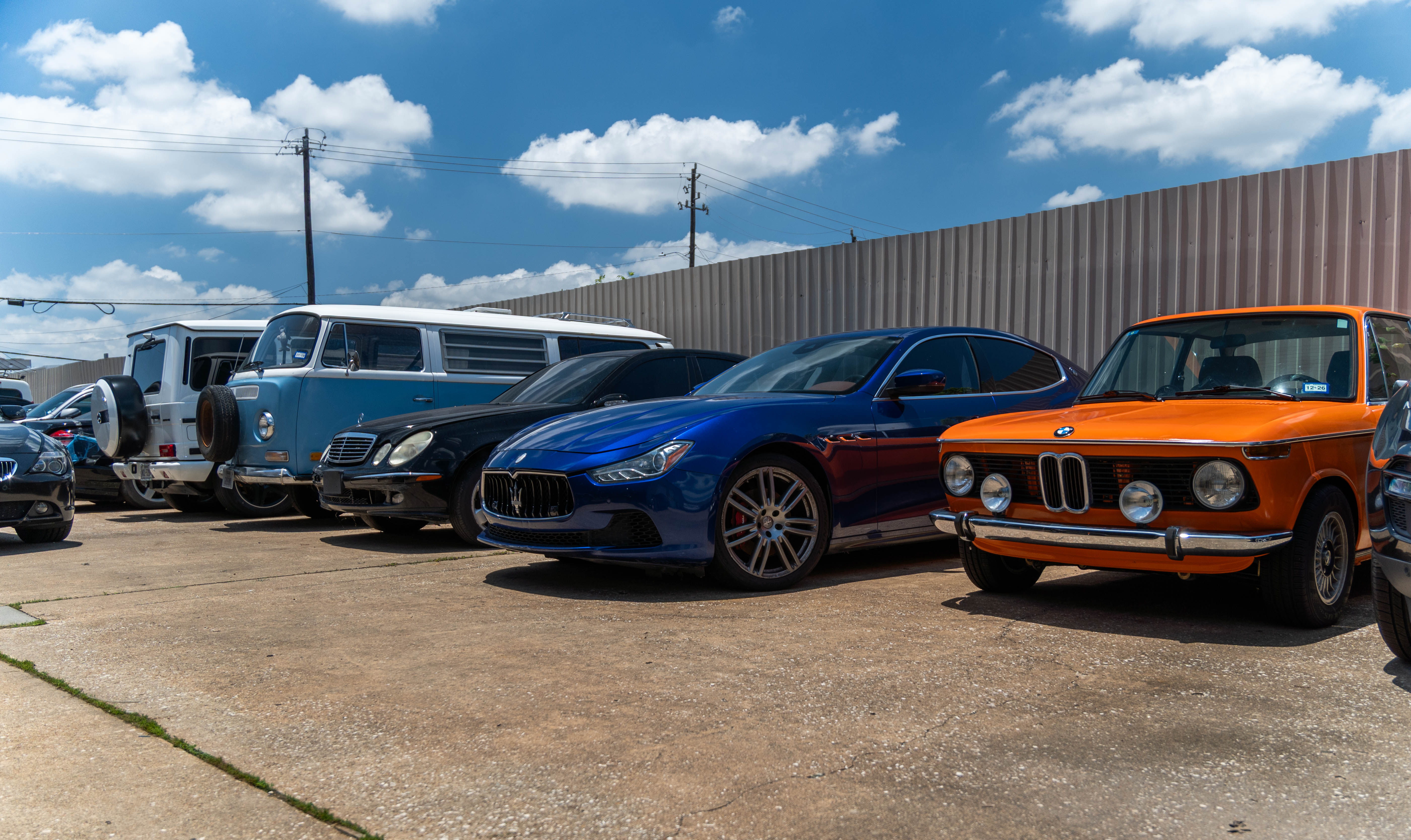 Group photo of Maserati Ghibli and BMW 2002 E10 2