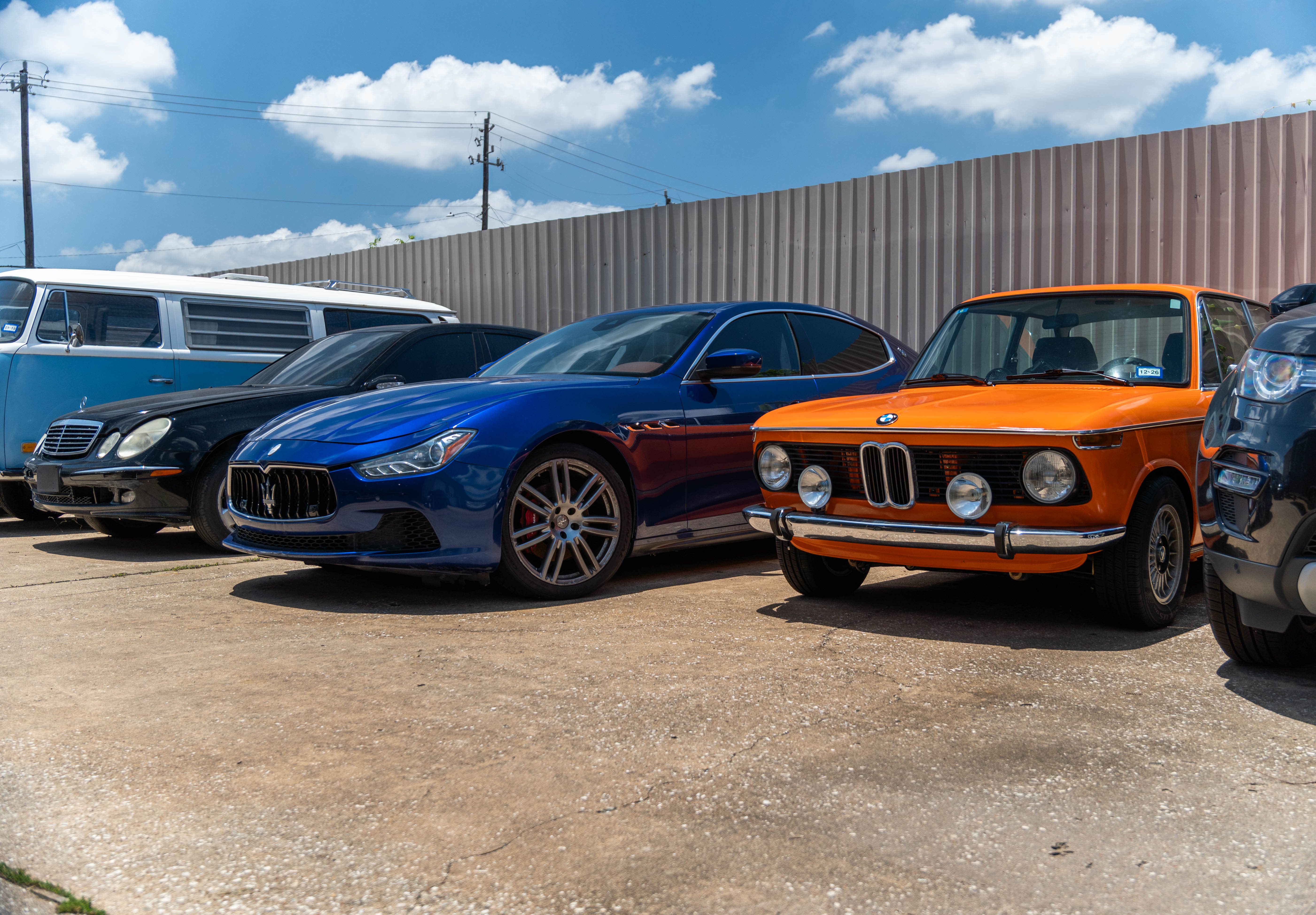Group photo of Maserati Ghibli and BMW 2002 E10